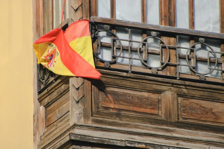 Spain’s has flag on a balcony in Valencia, Spain