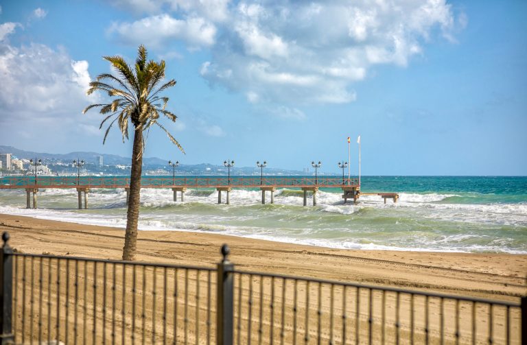 wooden pier on the Costa del Sol in Marbella, Spain